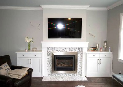Complete mantel with side cabinets.